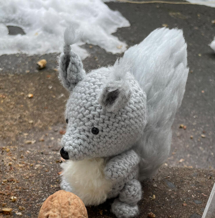 Crochet Squirrel, everything on him is acrylic yarn besides the nose and eyes